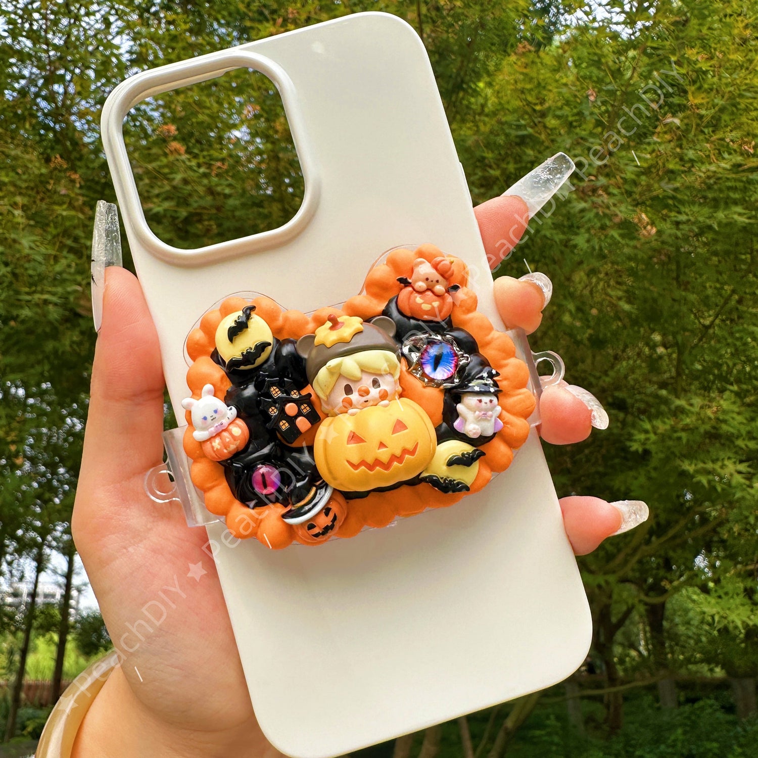 Handmade decoden phone case with food-themed  or sanrio charms