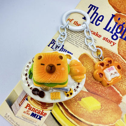 Handmade capybara and sandwich polymeclay keychain 